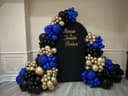 Royal blue, gold and black garland with anniversary names in gold script